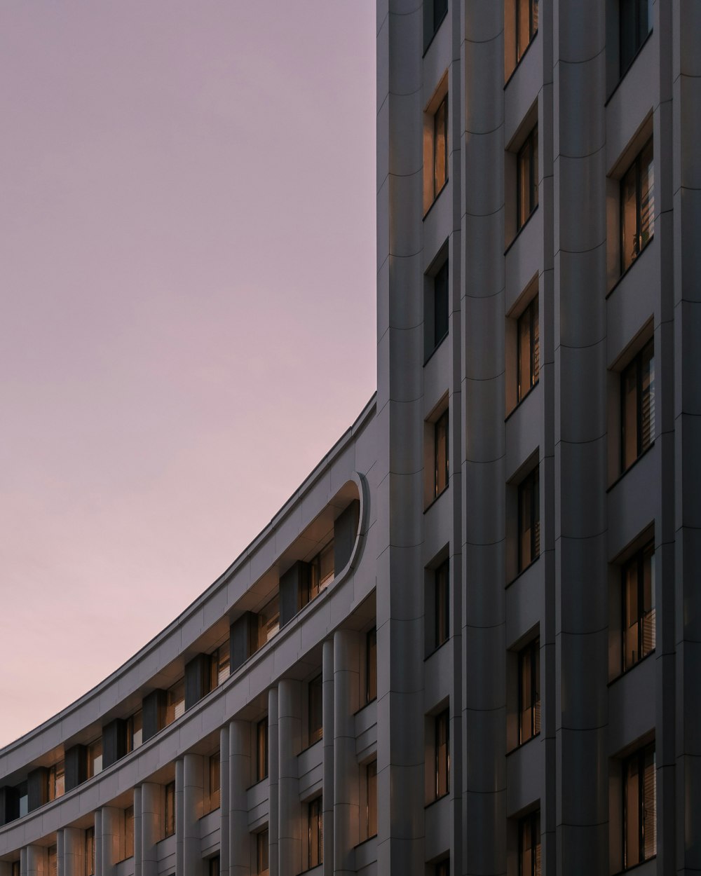 brown concrete building under blue sky during daytime