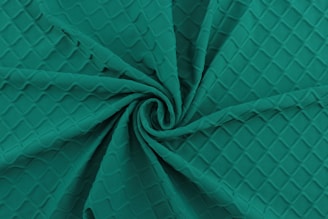 blue textile in close up photography