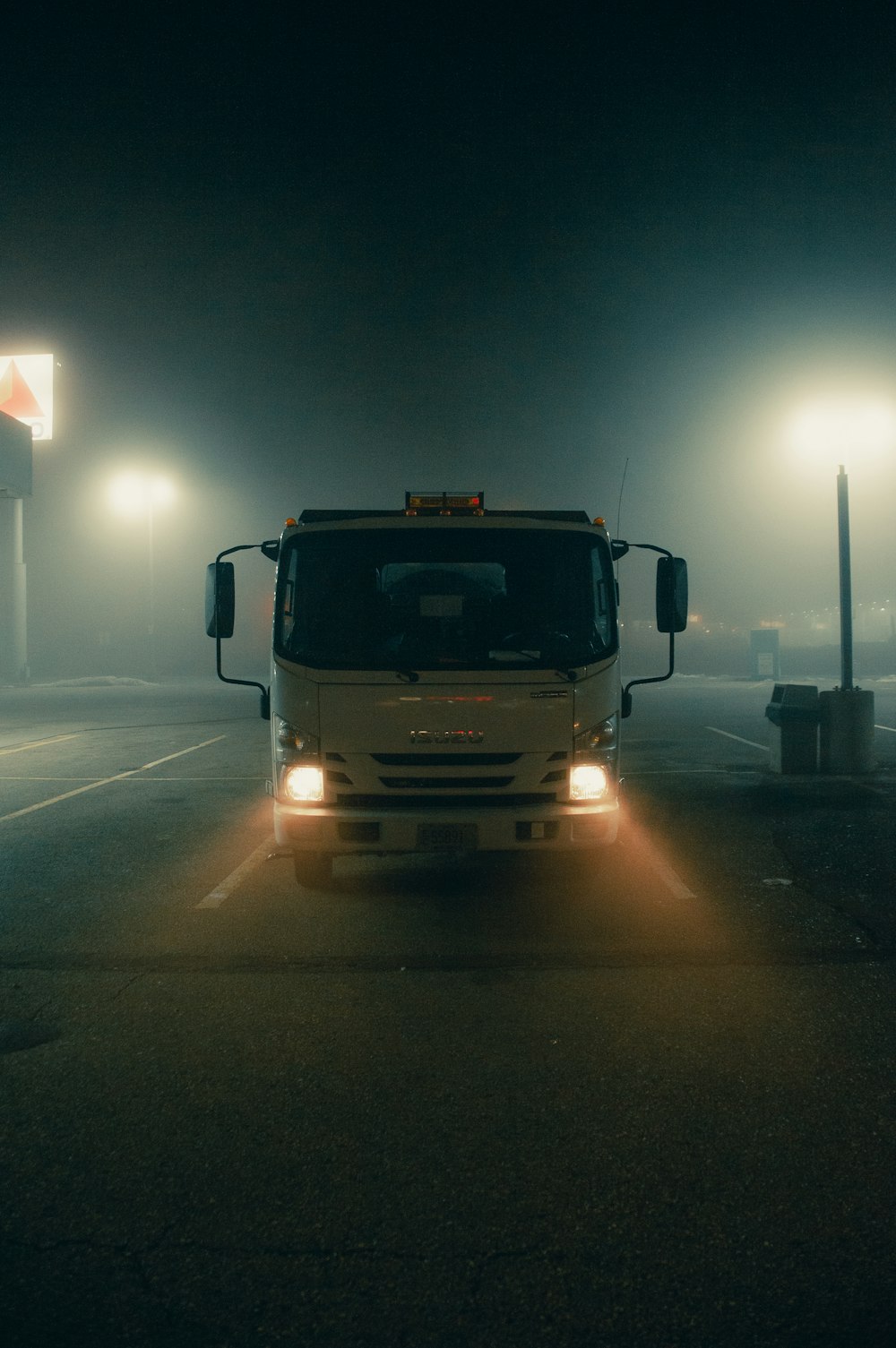 white truck on road during night time
