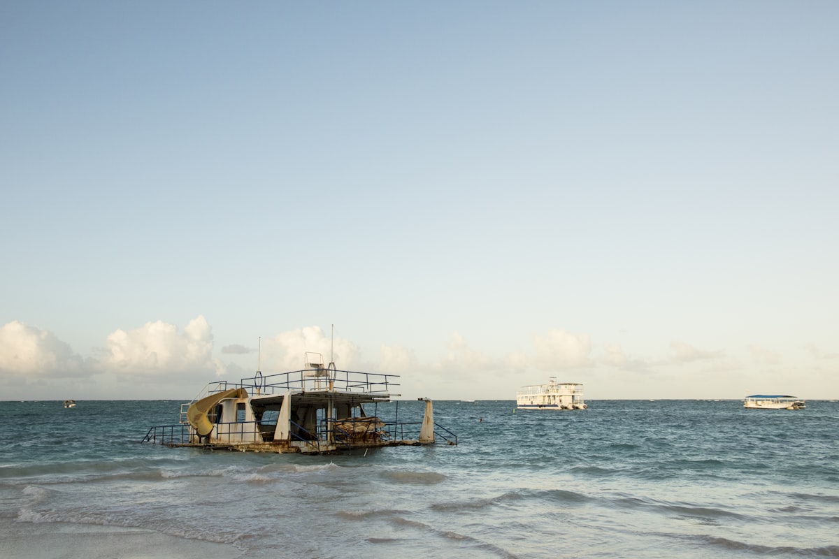 Dominican Republic March — pristine beach with gentle surf and tropical palms in the late dry season