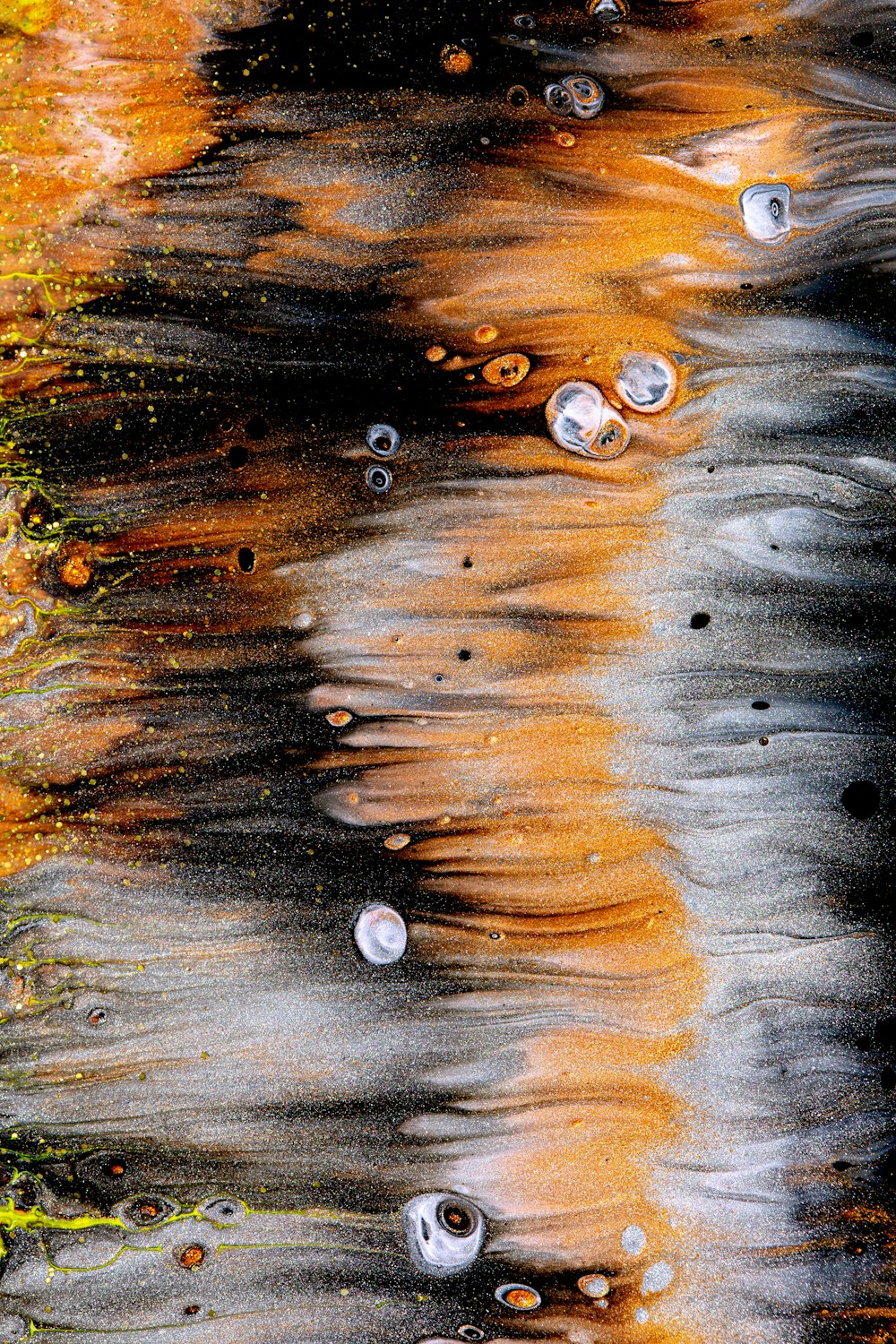 water droplets on brown surface