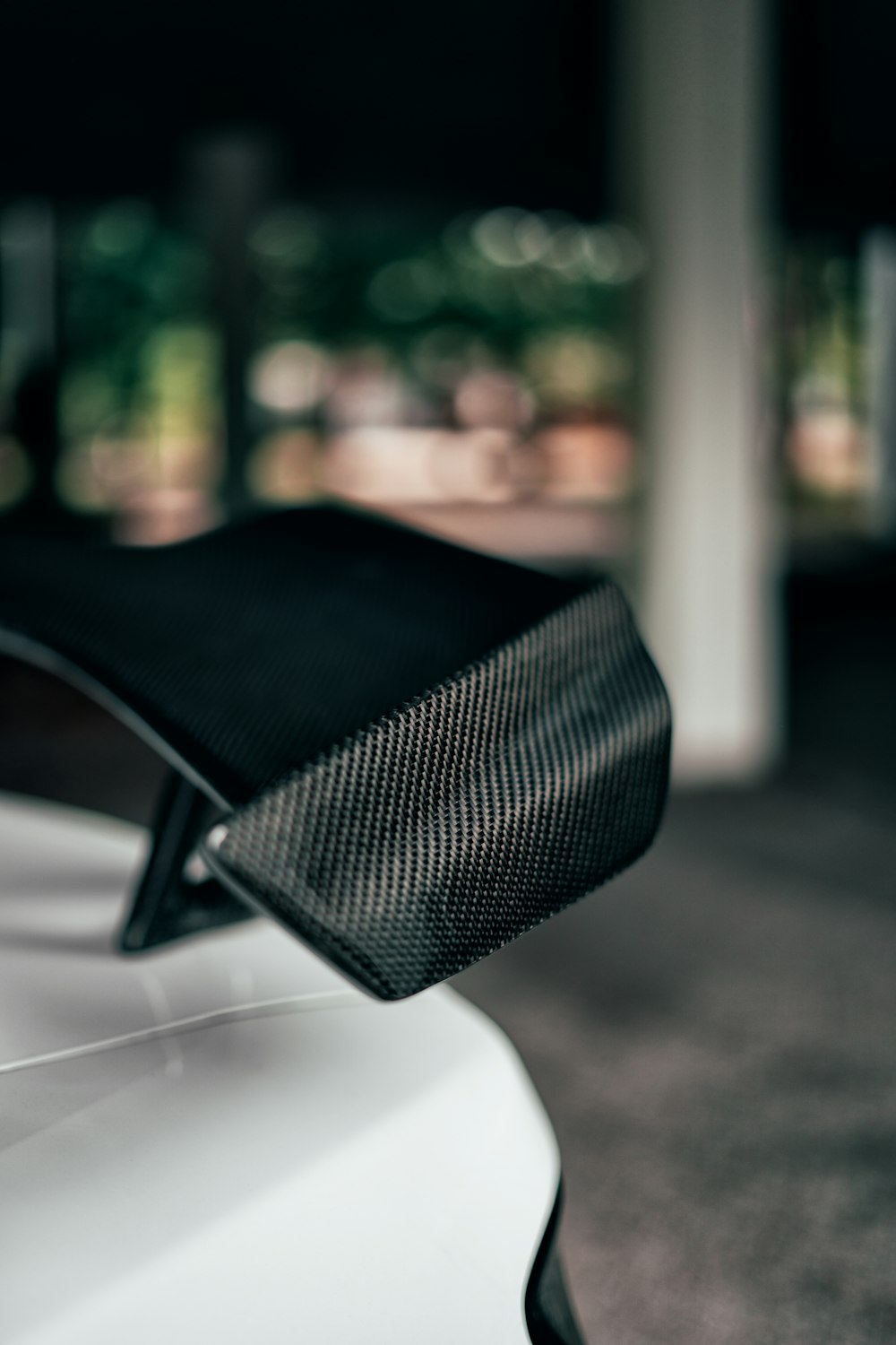 black leather chair near white table