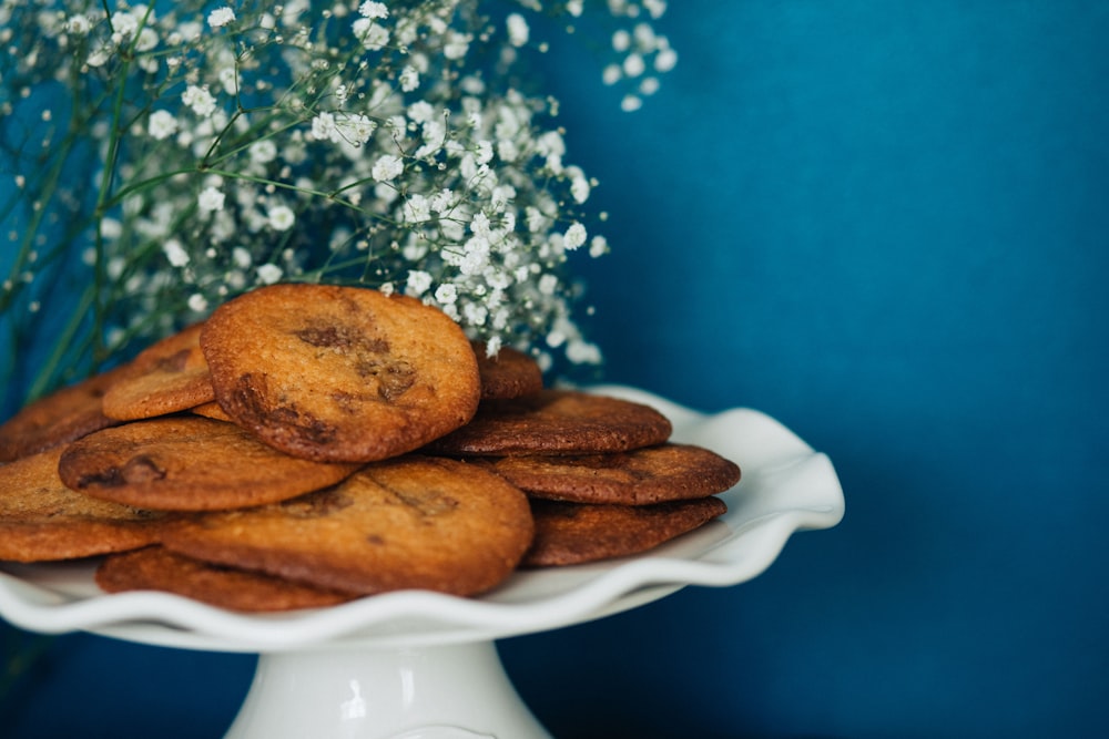 brown cookies on white ceramic plate