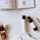 Flat lay of skincare products with lavender accents on a white background.