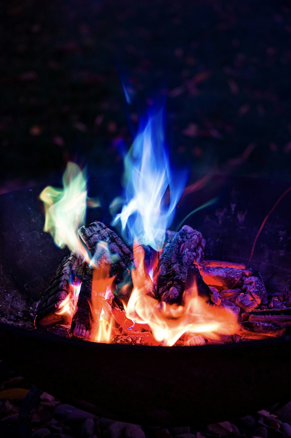 blue and red fire in black background