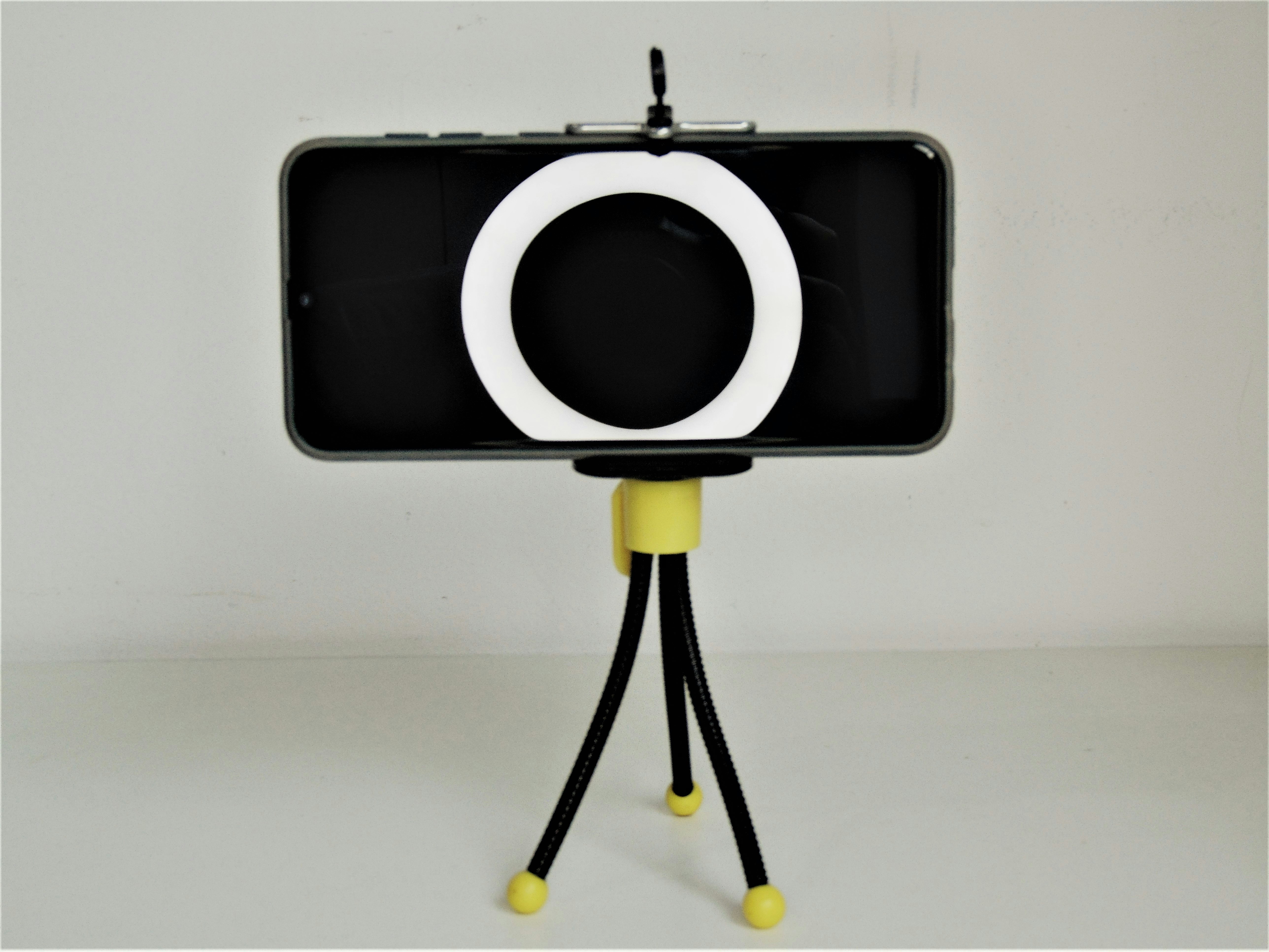 Smartphone on white background, bright studio