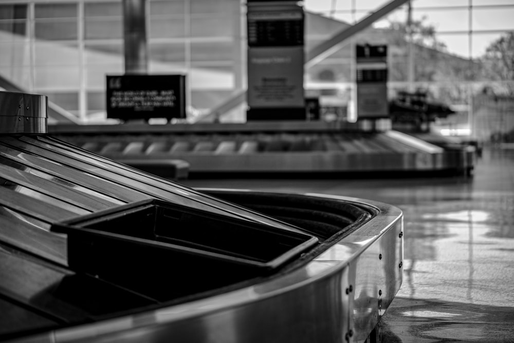 grayscale photo of a train station