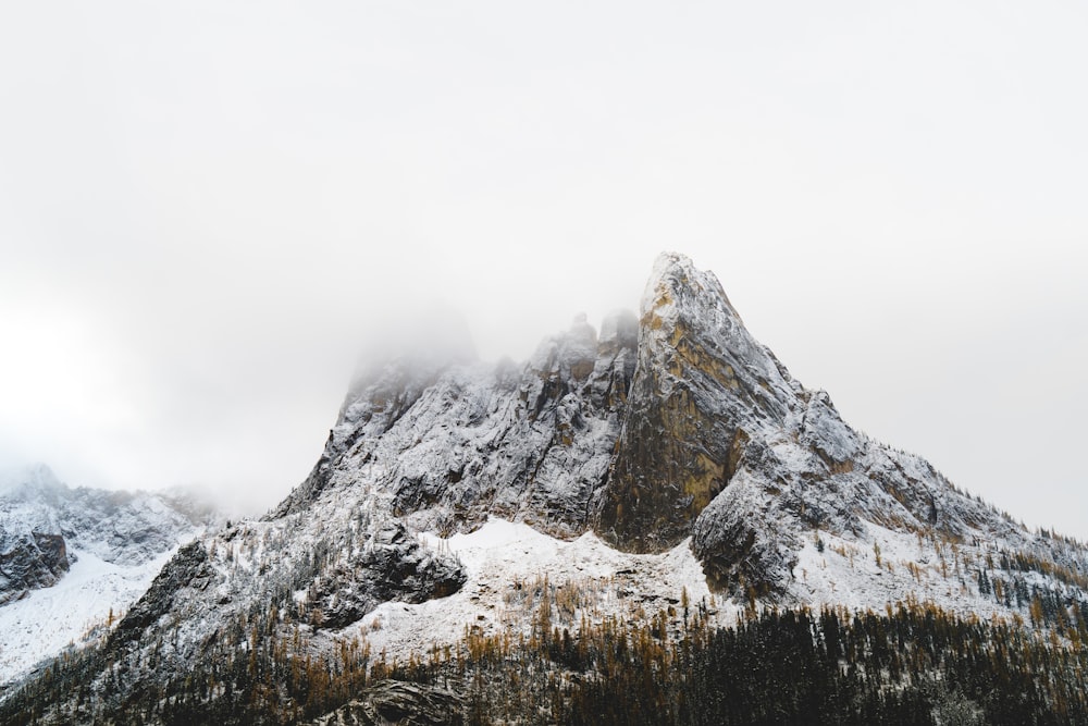 snow covered mountain during daytime