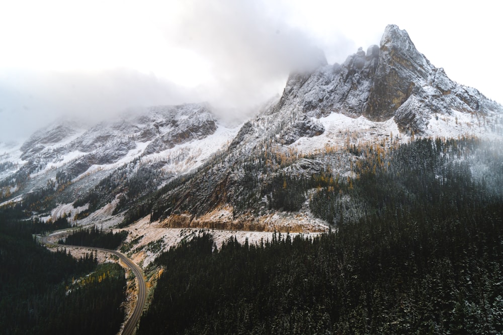 snow covered mountain during daytime