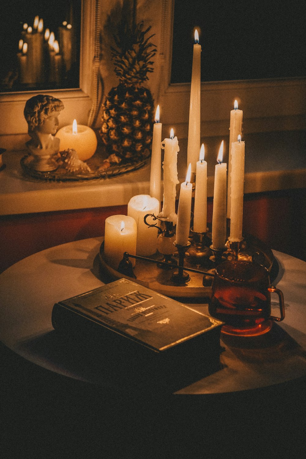 white candles on brown wooden table