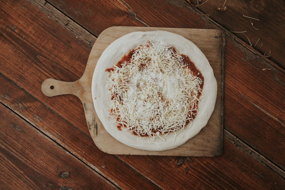 white round bowl on brown wooden table