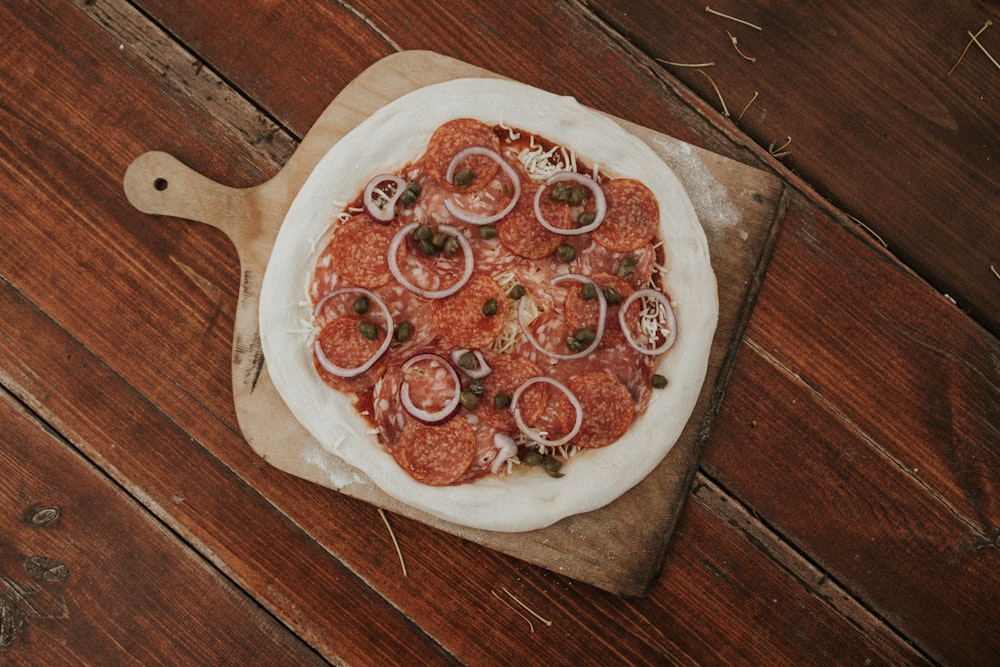 pizza on white ceramic plate