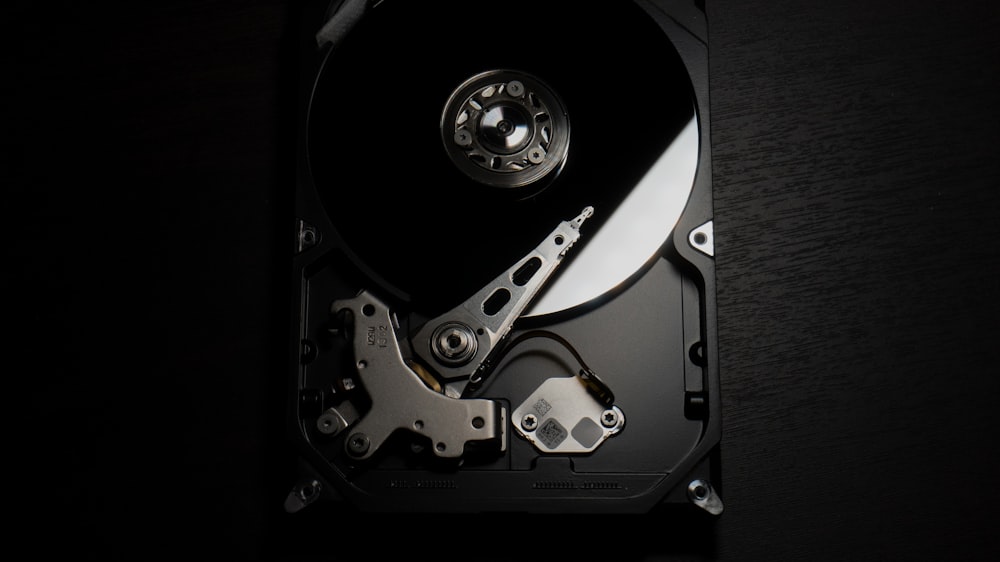 black and silver hard disk drive