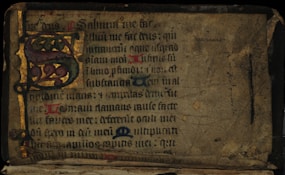 a very old book with some writing on it
