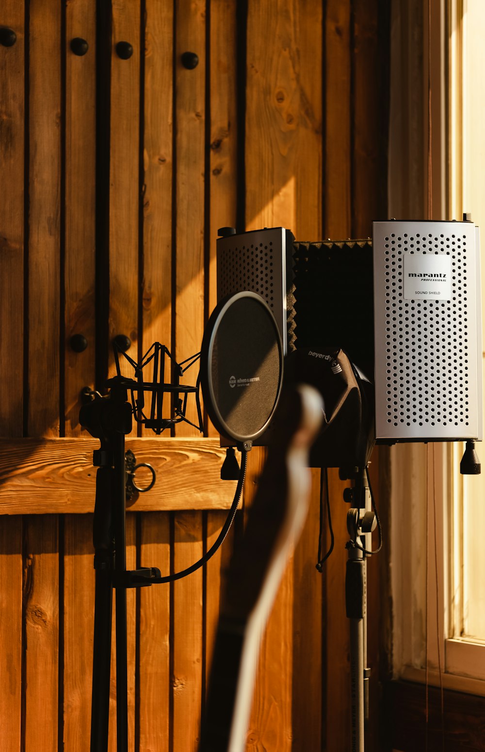 black and gray microphone on stand