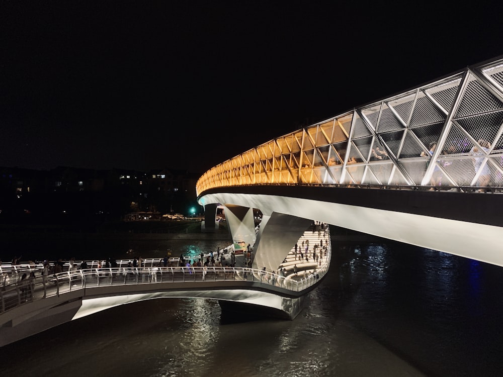 white and brown bridge during night time