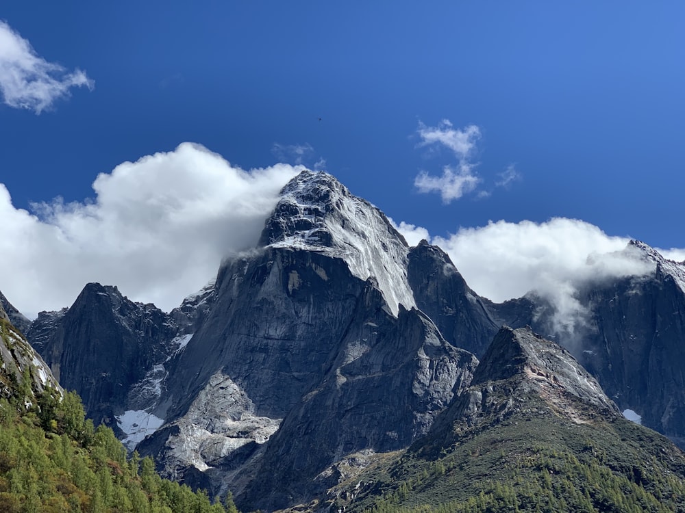 gray and white mountain under blue sky during daytime