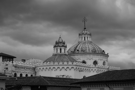 grayscale photo of concrete building in Iglesia de la Compañía Ecuador