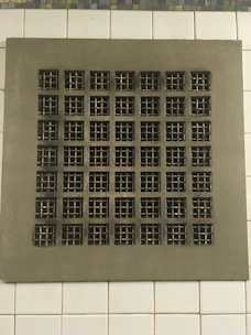 Close-up of a clean ventilation grille with fresh airflow.