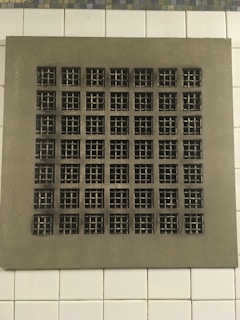 A clean, shiny air vent grate after a detailed cleaning session.