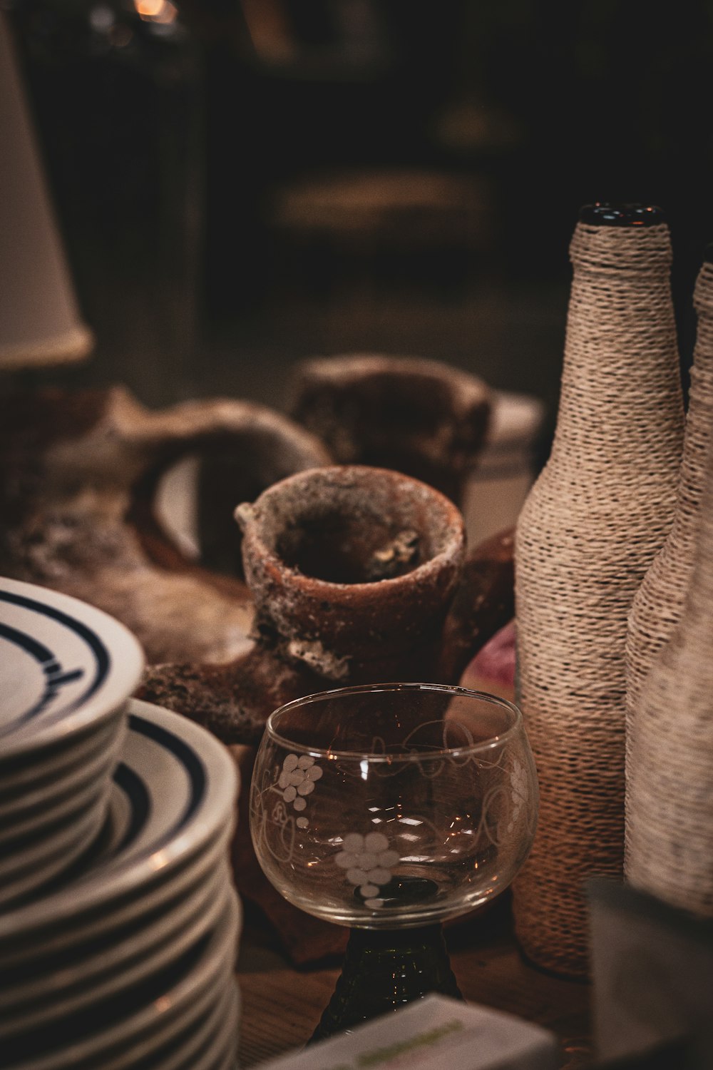 clear drinking glass on brown wooden table