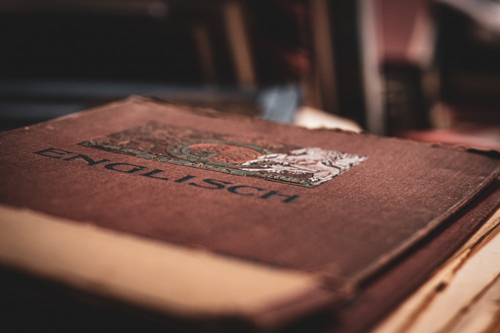 brown and black hardbound book