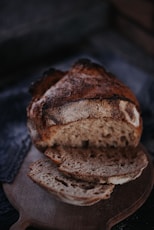 brown bread on black textile