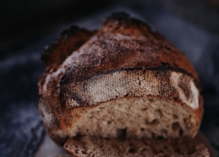 brown bread on black textile