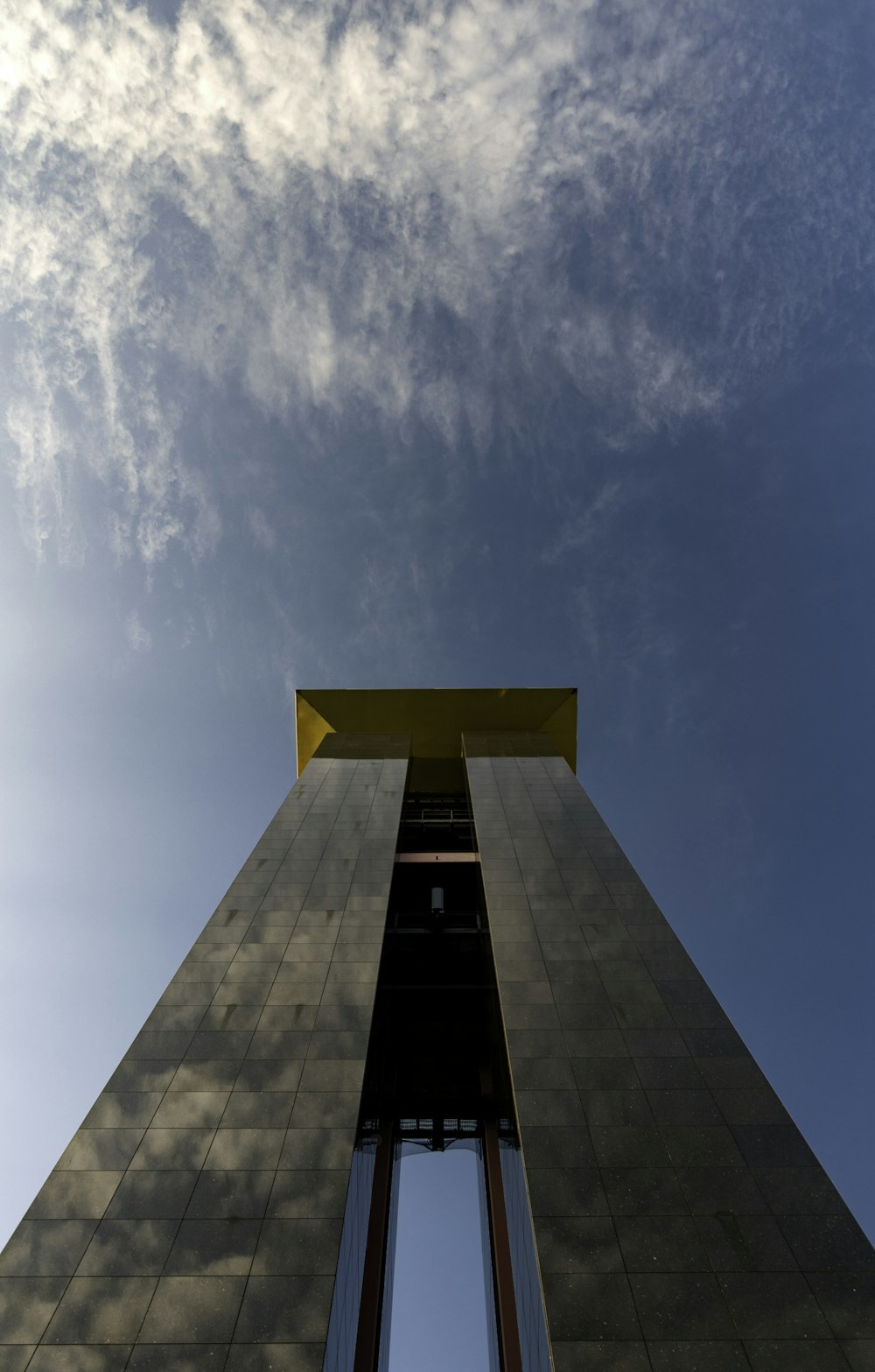 brown concrete building under blue sky during daytime