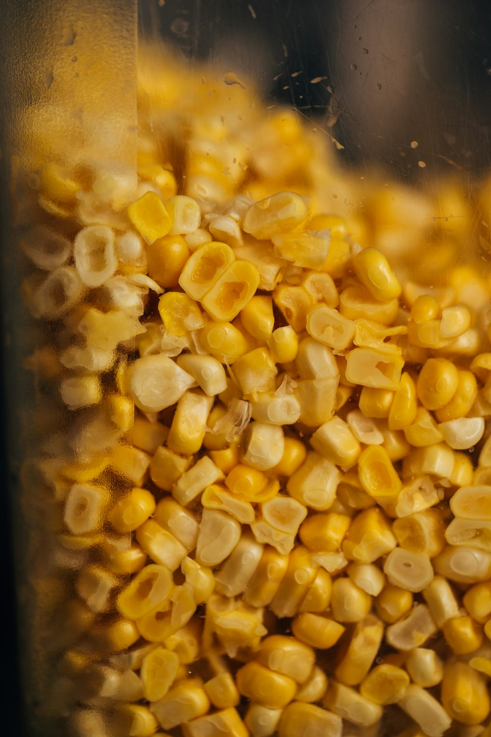 yellow corn on clear plastic container