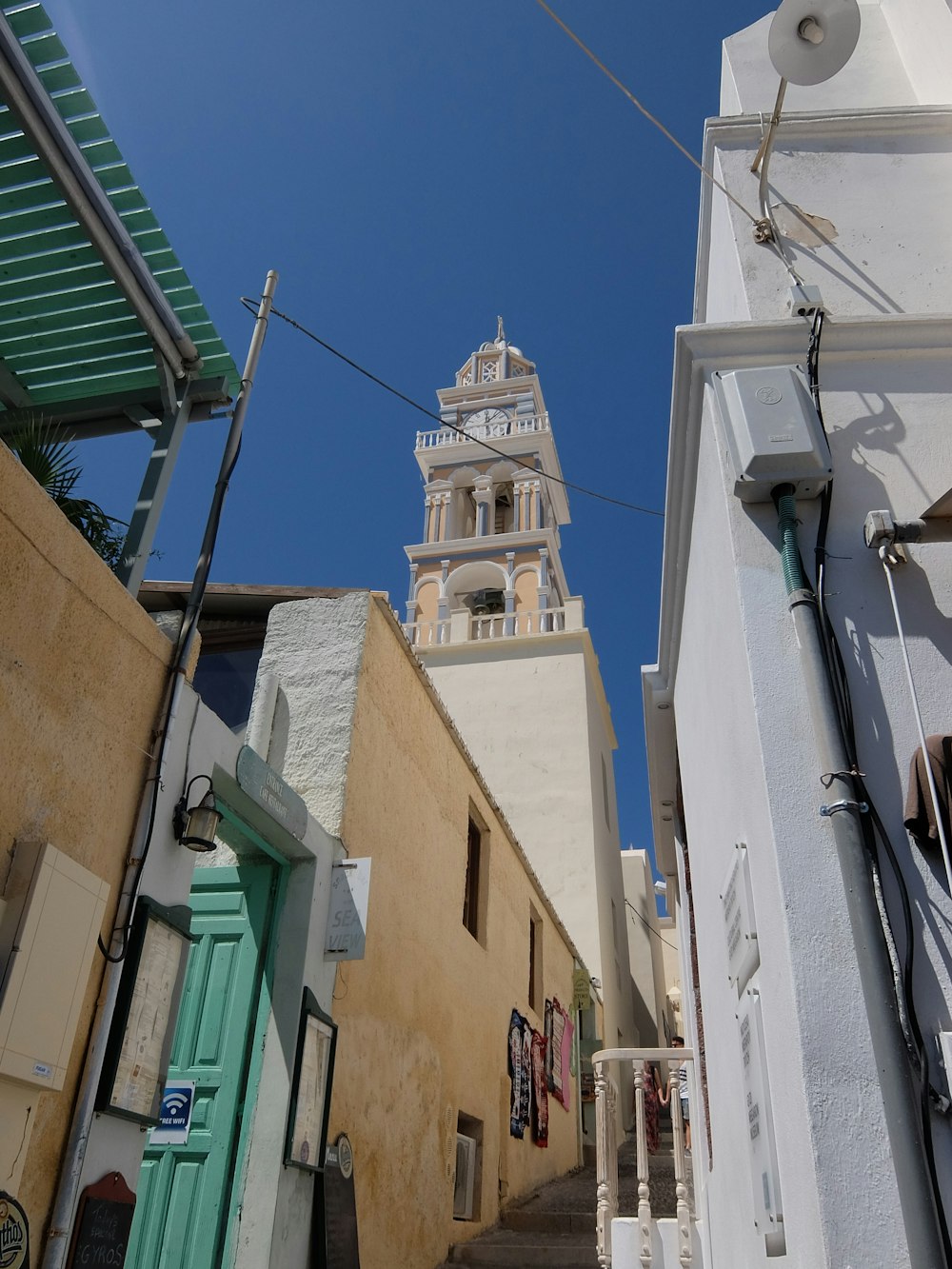 white and brown concrete building under blue sky during daytime