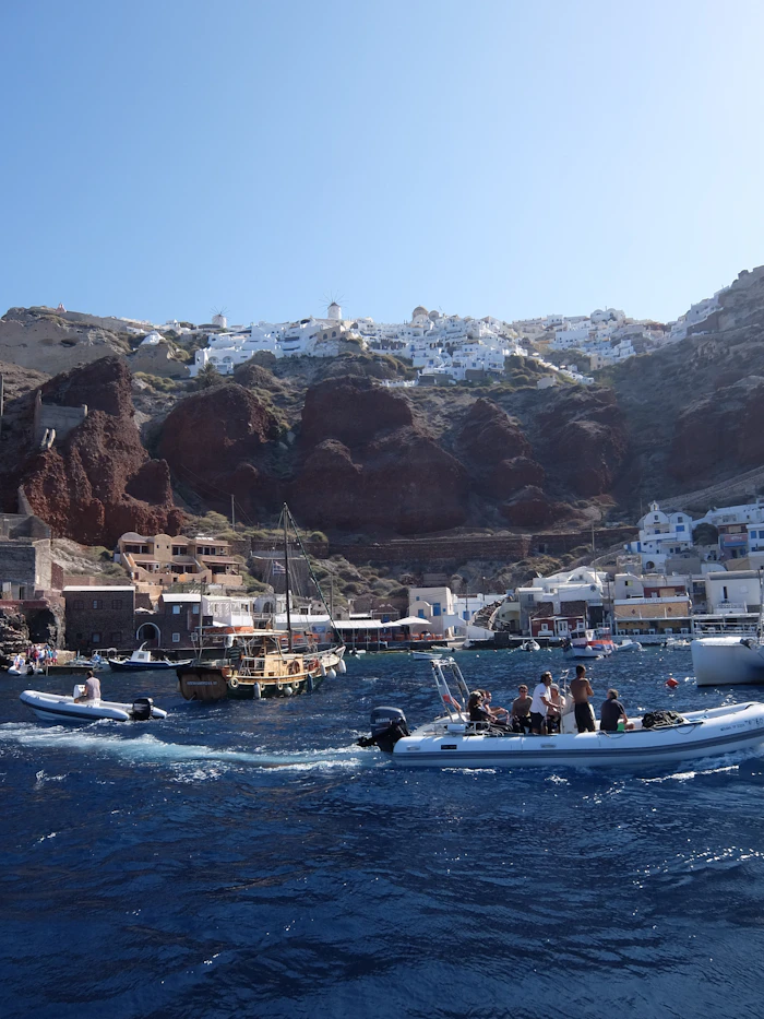 Private full-day catamaran charter Santorini with swimming and snorkeling