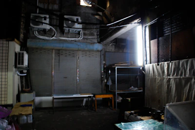 Image of drying equipment set up in an office space with fans and dehumidifiers running.