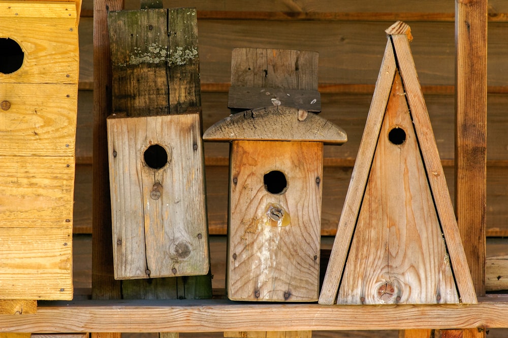 brown wooden bird house on brown wooden table