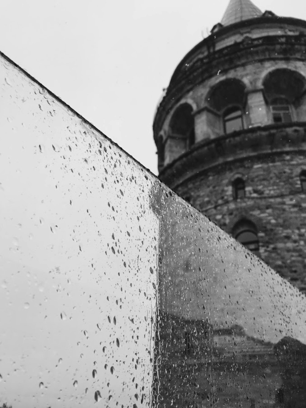 grayscale photo of concrete building