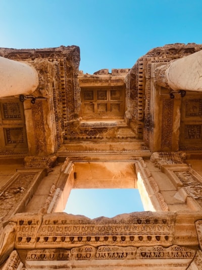 brown concrete building under blue sky during daytime