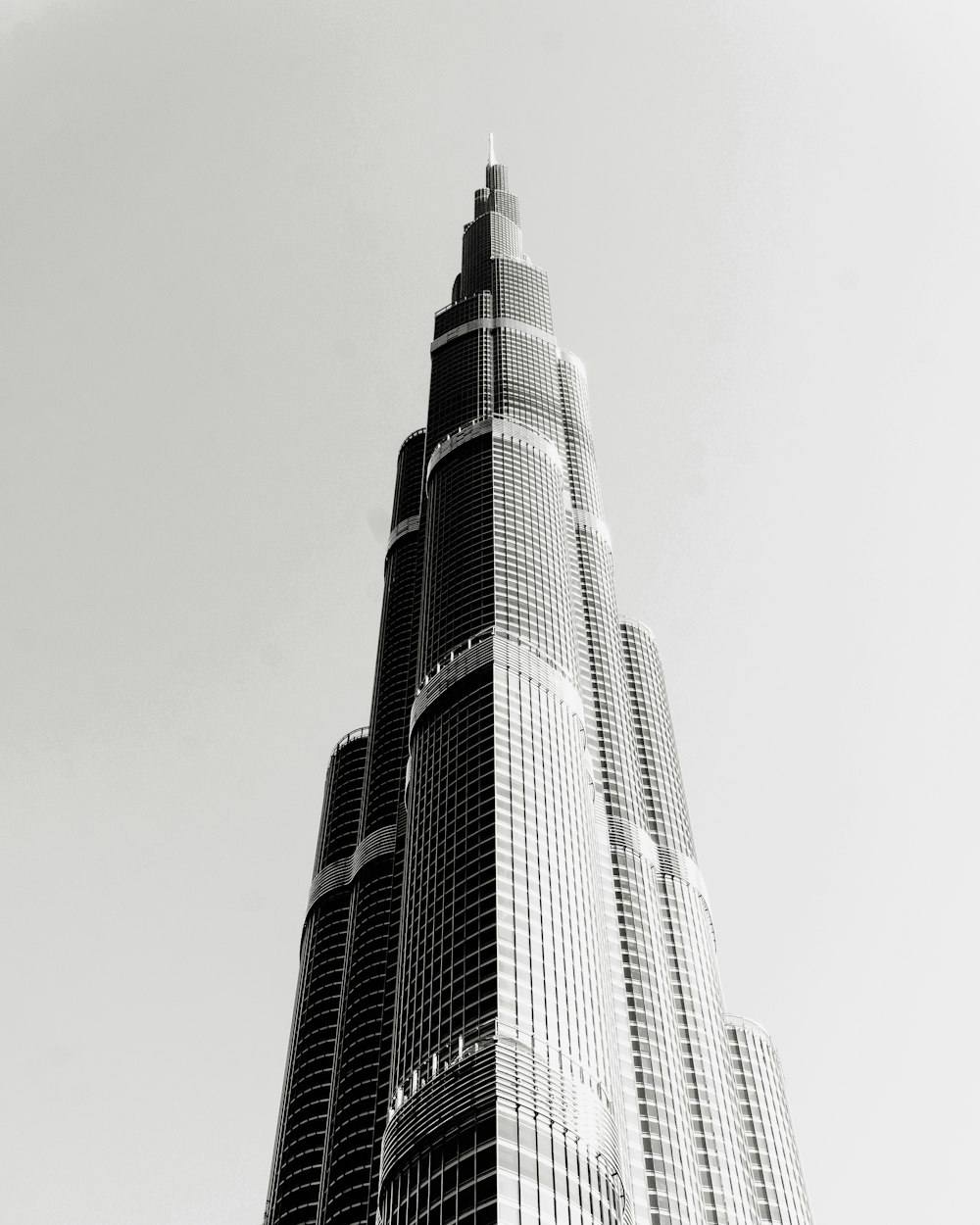 grayscale photo of high rise building