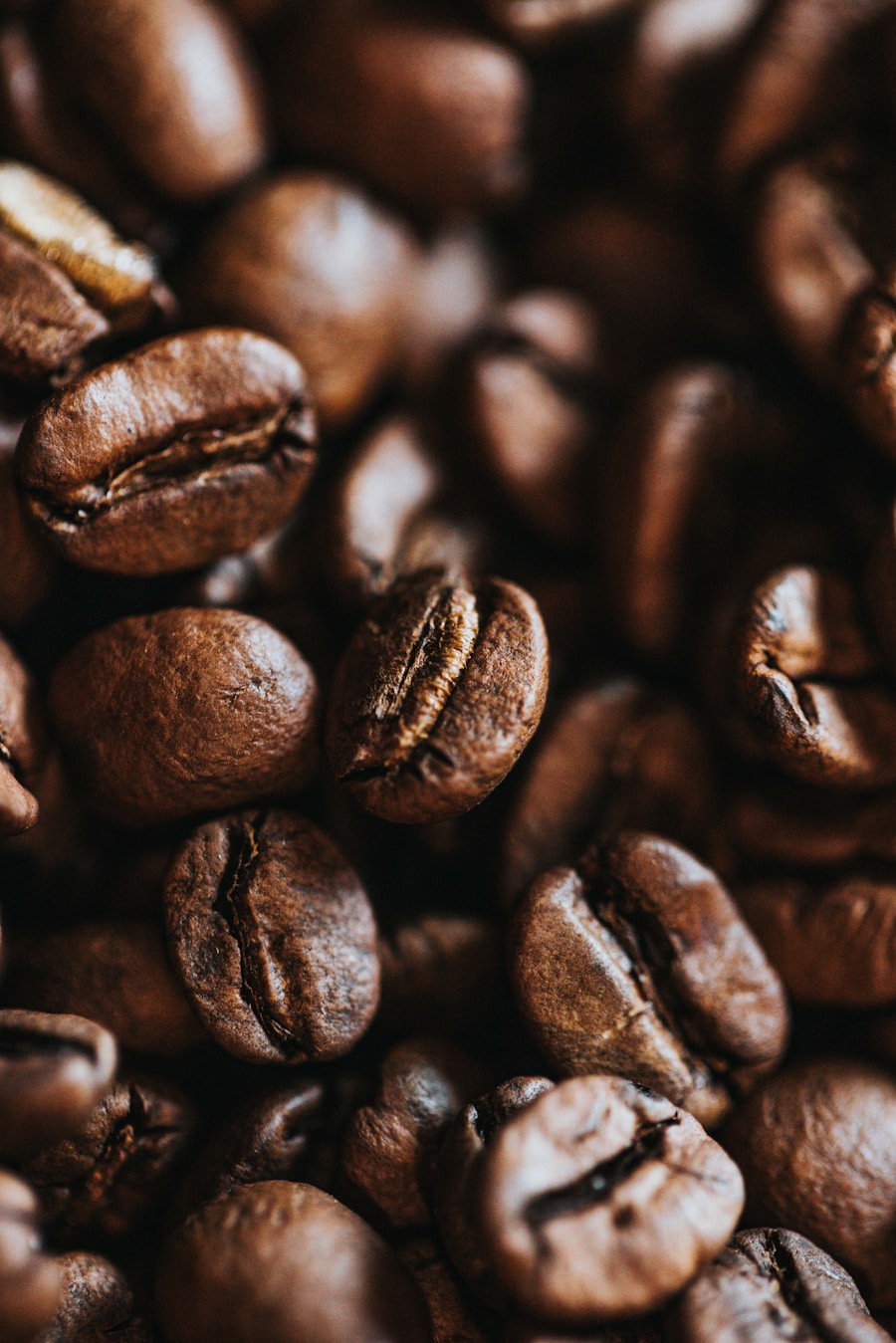 A macro shot of roasted coffee beans with shallow depth of field