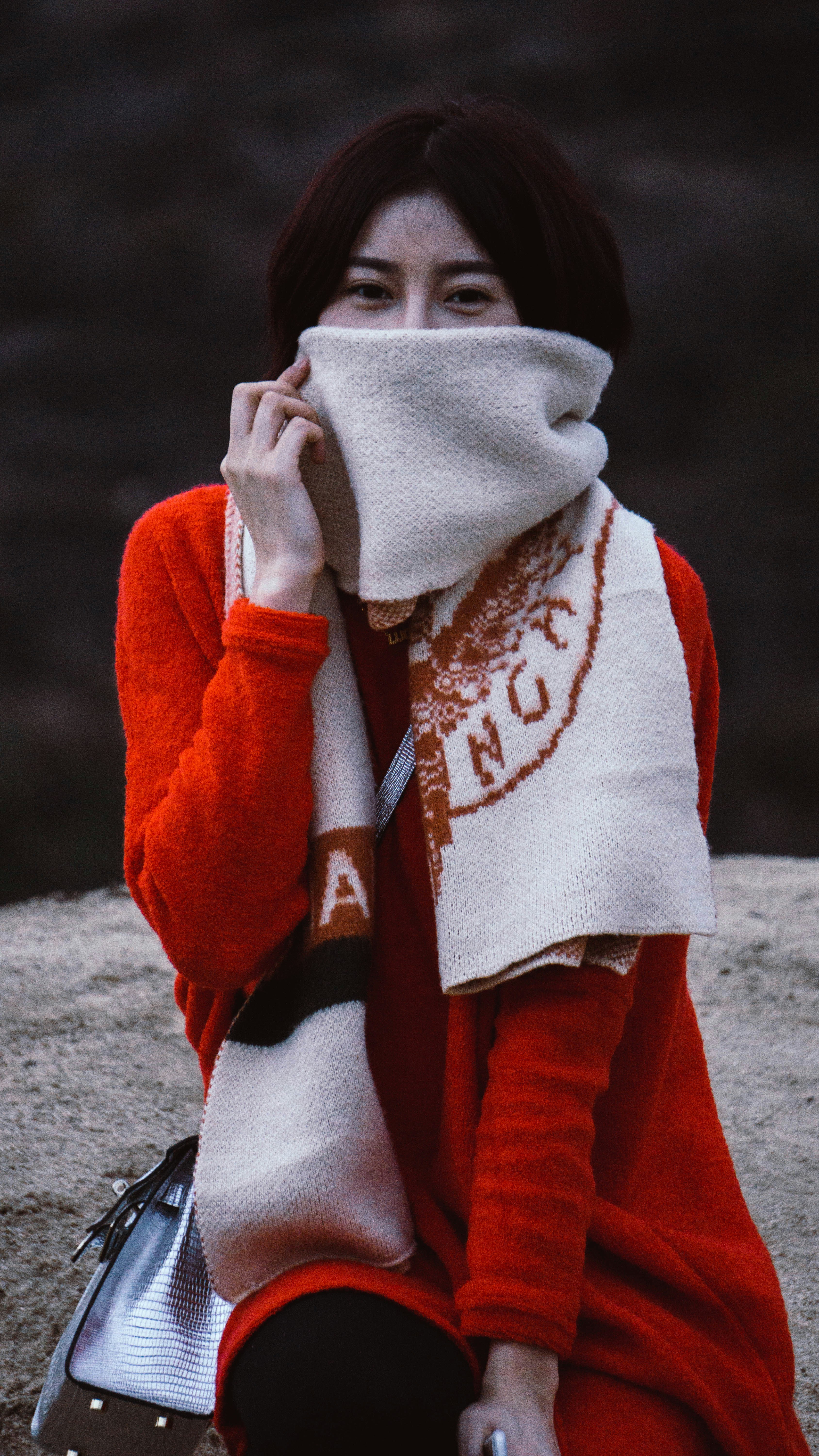 person in red and white hoodie