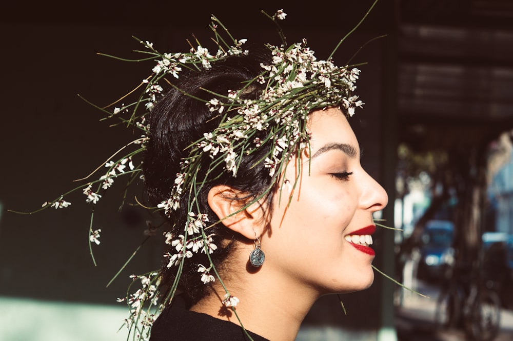 woman in black and silver earrings