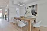 Before and after images of a stylish dining room renovation.