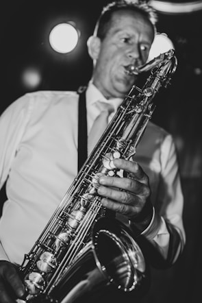 A close-up of a musician playing a soulful melody.