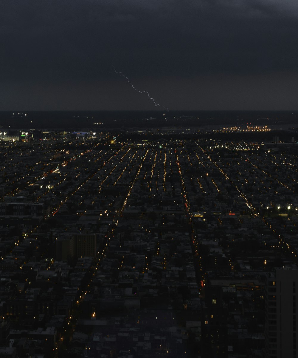 city with high rise buildings during night time