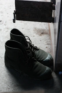 black leather lace up boots