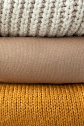 white and gray knit textile