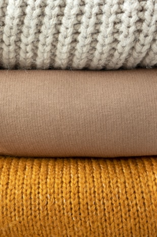 white and gray knit textile