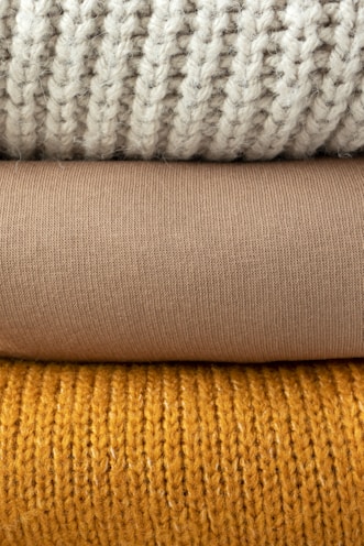 white and gray knit textile
