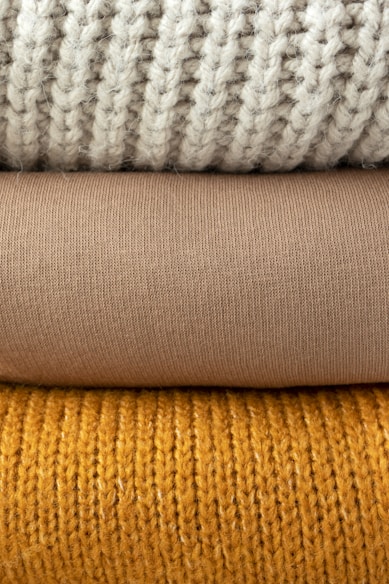 white and gray knit textile