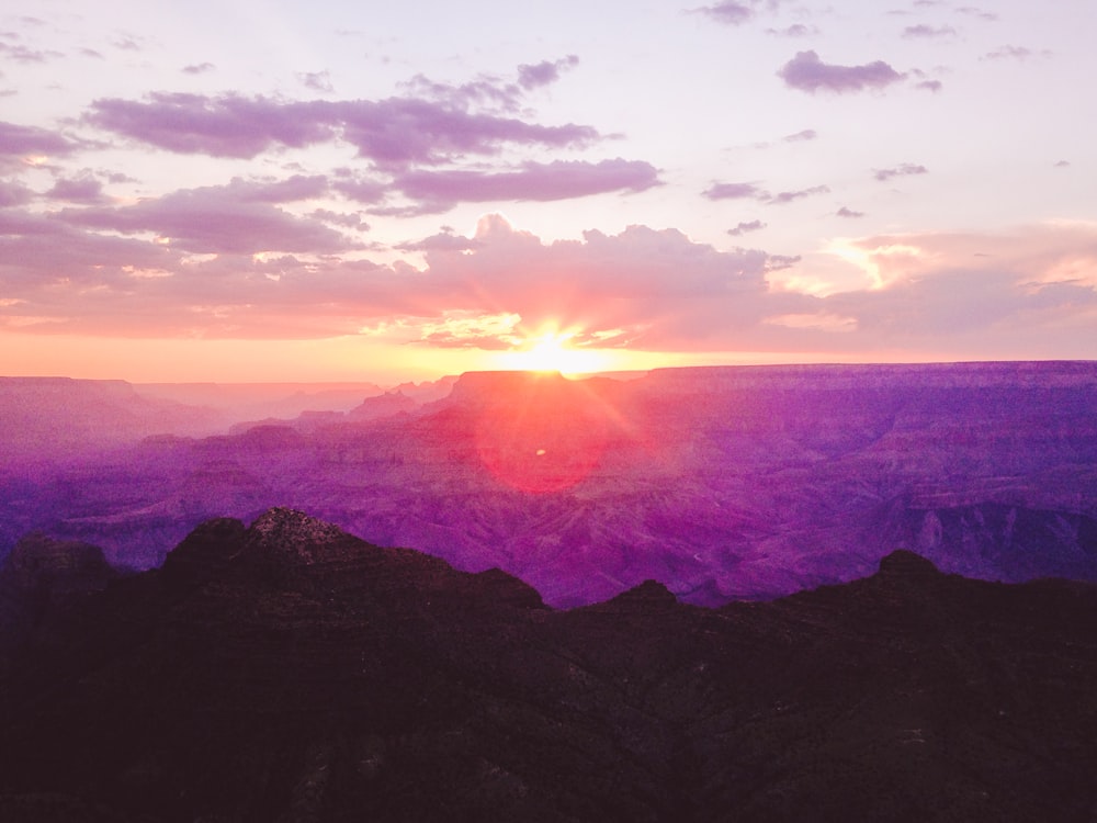 silhouette of mountain during sunset