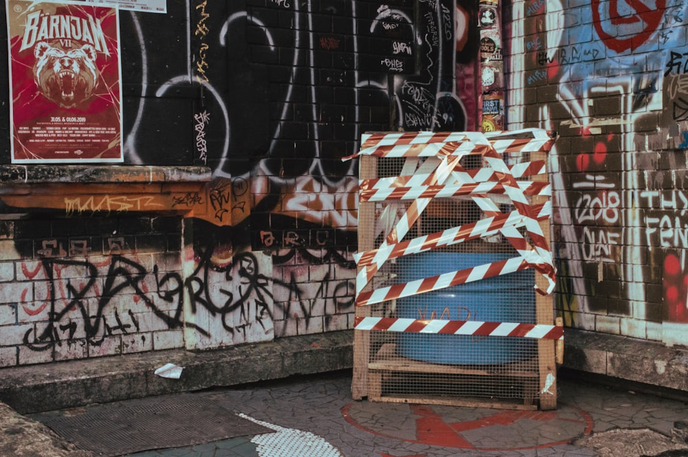 white red and blue plastic chairs on sidewalk